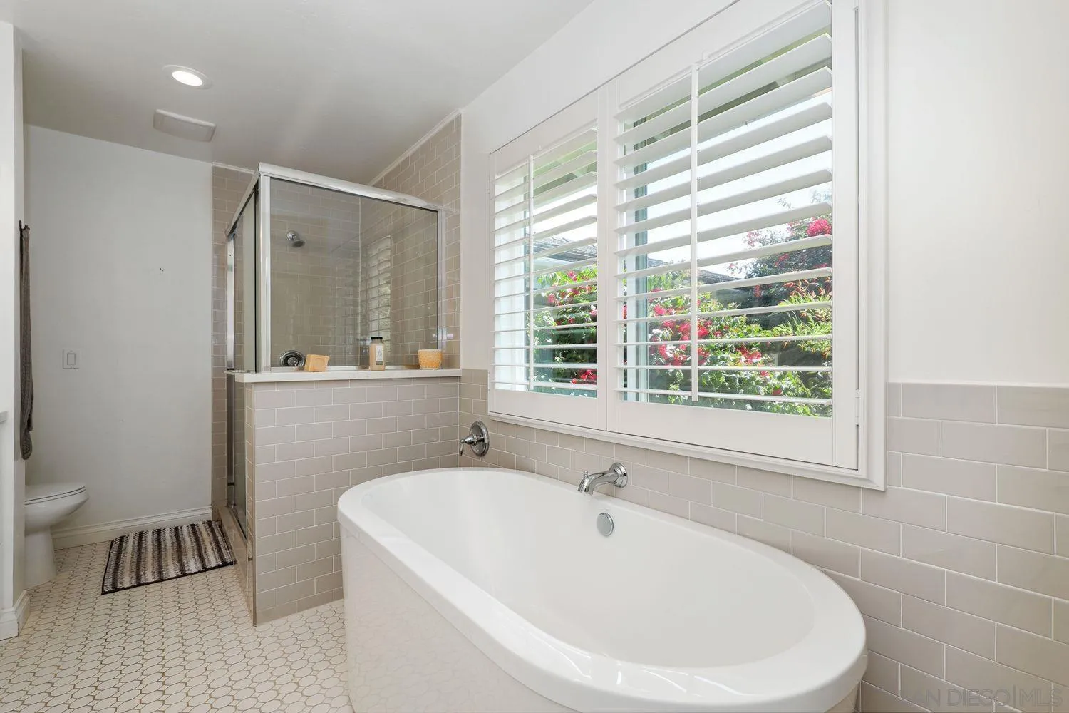 1921 Winterwarm Drive Fallbrook, CA 92028 - Photo 20 of 32 a bathroom with a sink and a bathtub