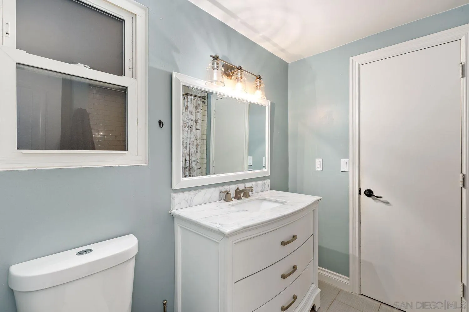 1921 Winterwarm Drive Fallbrook, CA 92028 - Photo 23 of 32 a bathroom with a sink toilet and mirror