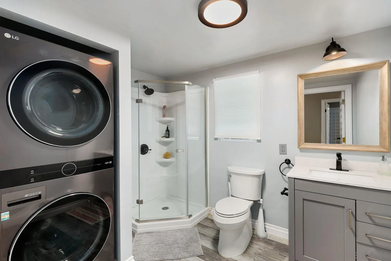 1921 Winterwarm Drive Fallbrook, CA 92028 - Photo 25 of 32 a bathroom with a toilet sink and a mirror