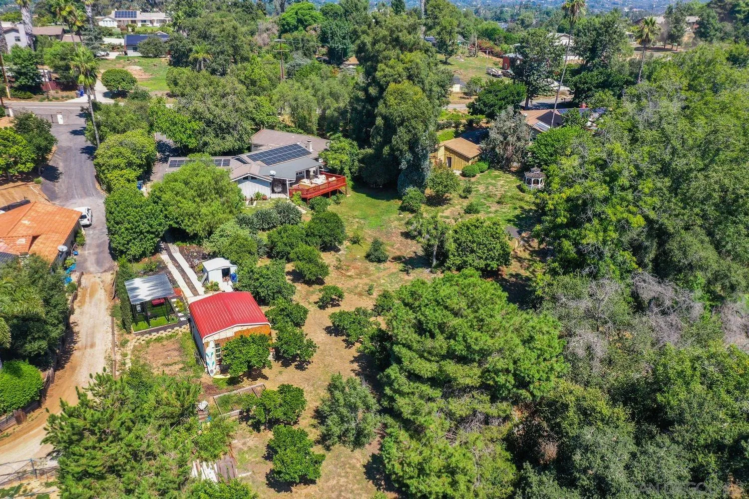 1921 Winterwarm Drive Fallbrook, CA 92028 - Photo 27 of 32 an aerial view of a house with a yard