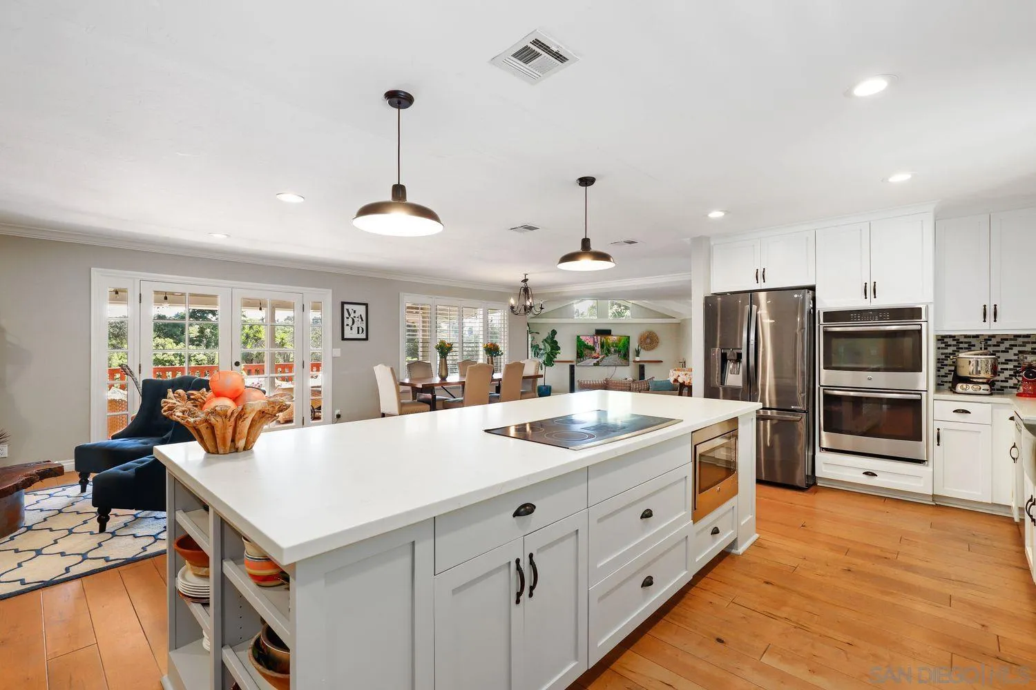 1921 Winterwarm Drive Fallbrook, CA 92028 - Photo 4 of 32 a kitchen with stainless steel appliances granite countertop a sink stove and refrigerator