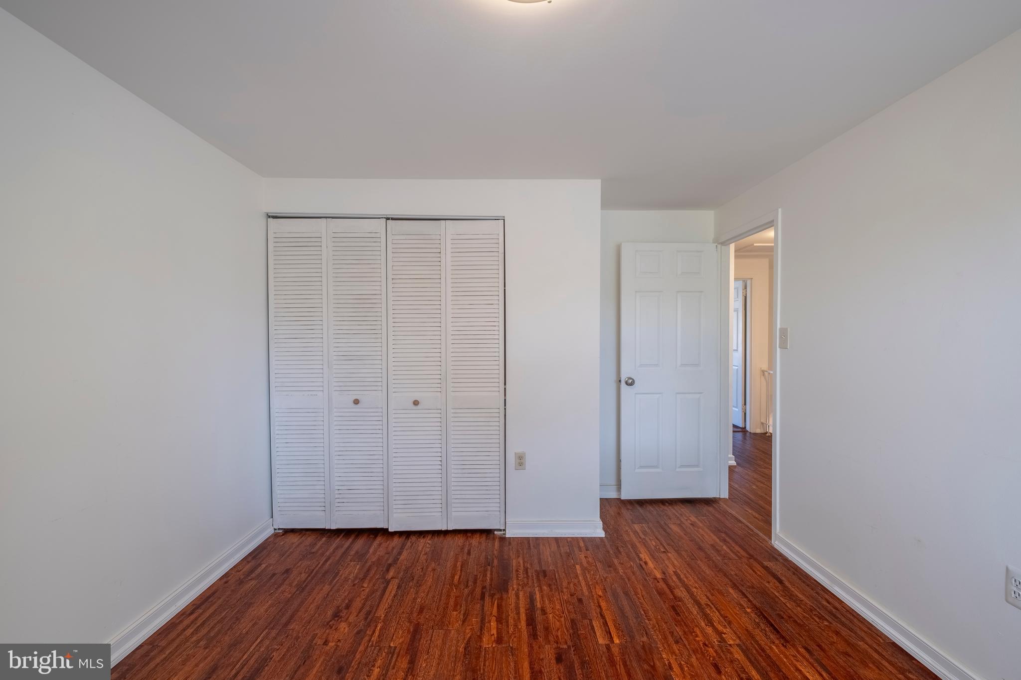 9637 Horizon Run Road, Unit 2H Montgomery Village, MD 20886 - Photo 25 of 28 wooden floor in a empty room