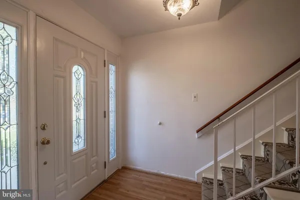 a view of entryway with a front door
