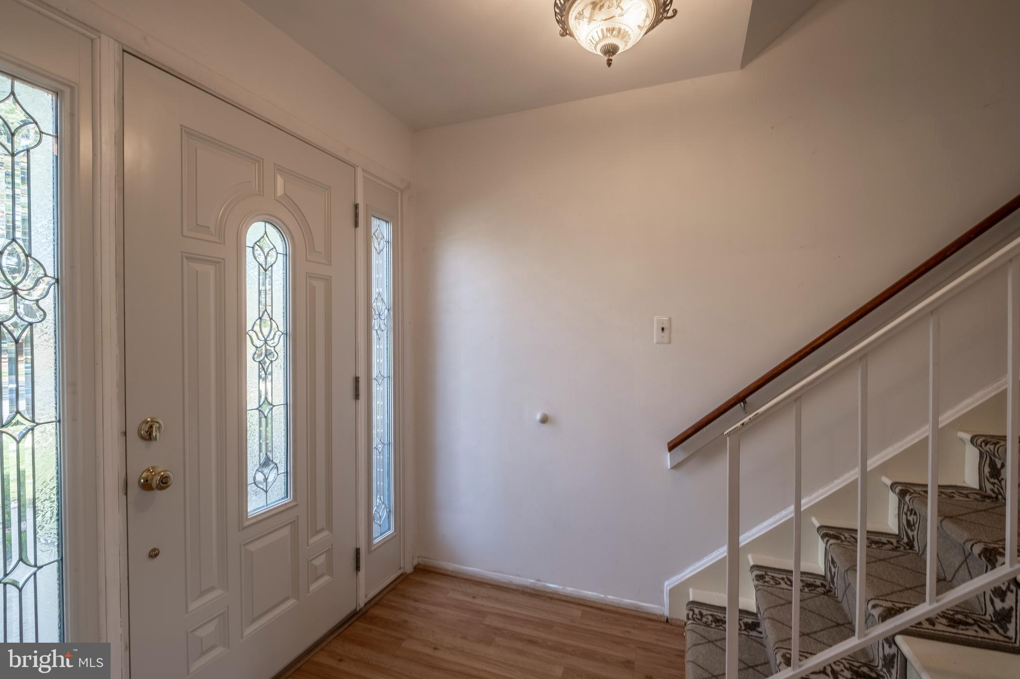 9637 Horizon Run Road, Unit 2H Montgomery Village, MD 20886 - Photo 10 of 28 a view of entryway with a front door