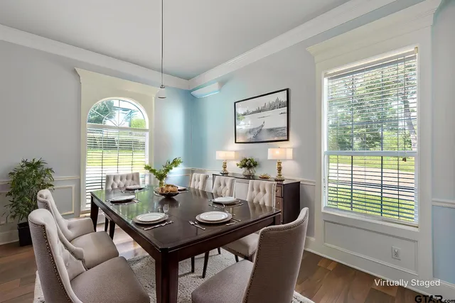 a view of a dining room with furniture window and outside view