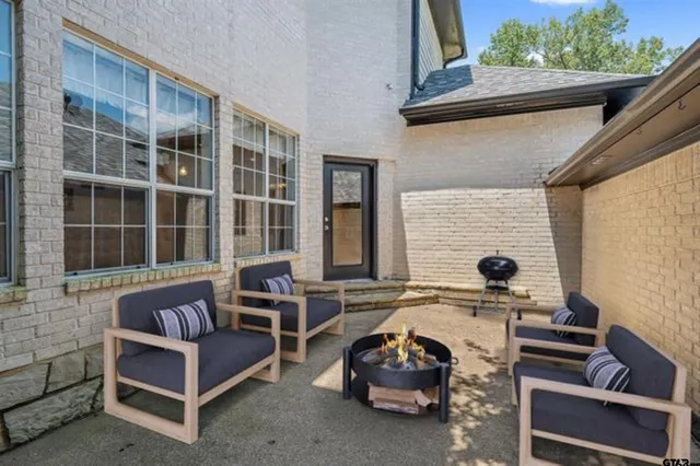 a building outdoor space with patio furniture