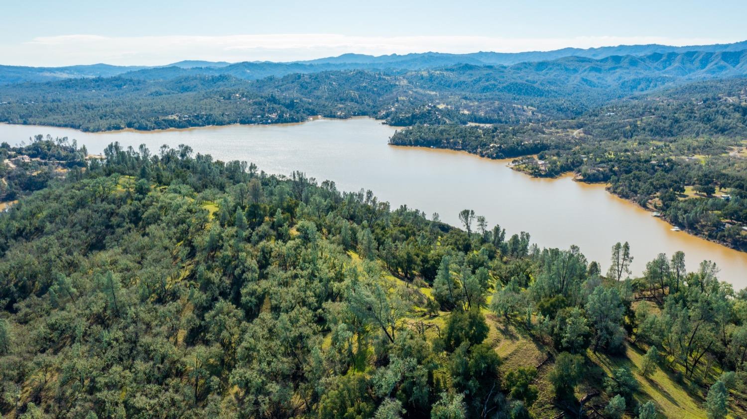 0 Lynch Canyon Road Bradley, CA 93426 - Photo 50 of 83 a view of a lake with a mountain and a forest