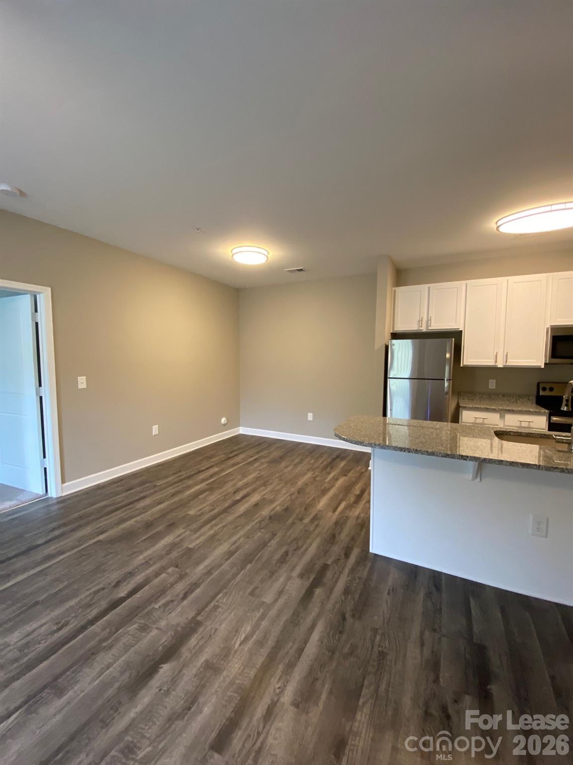 90 Riverside Drive Hickory, NC 28601 - Photo 12 of 15 a view of kitchen with wooden floor and electronic appliances