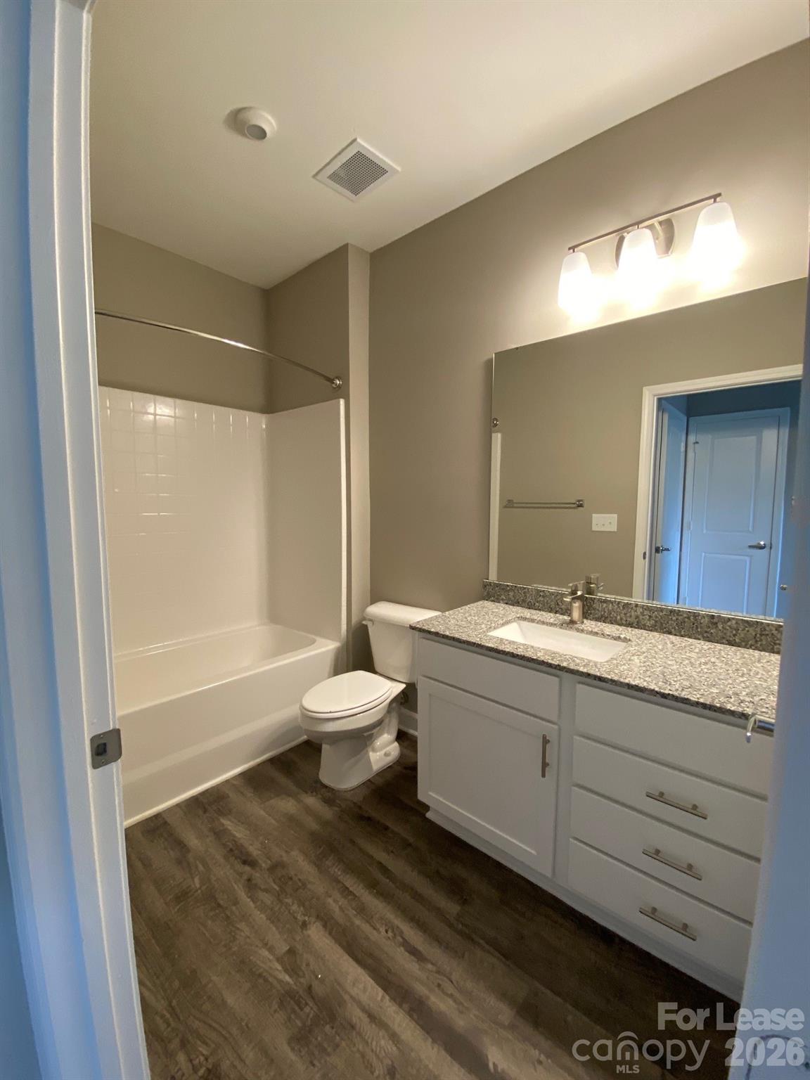 90 Riverside Drive Hickory, NC 28601 - Photo 15 of 15 a bathroom with a granite countertop sink toilet and shower