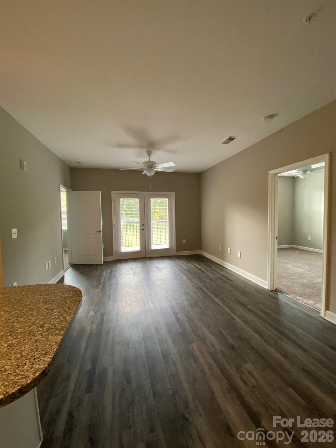 90 Riverside Drive Hickory, NC 28601 - Photo 10 of 15 wooden floor in an empty room with a window