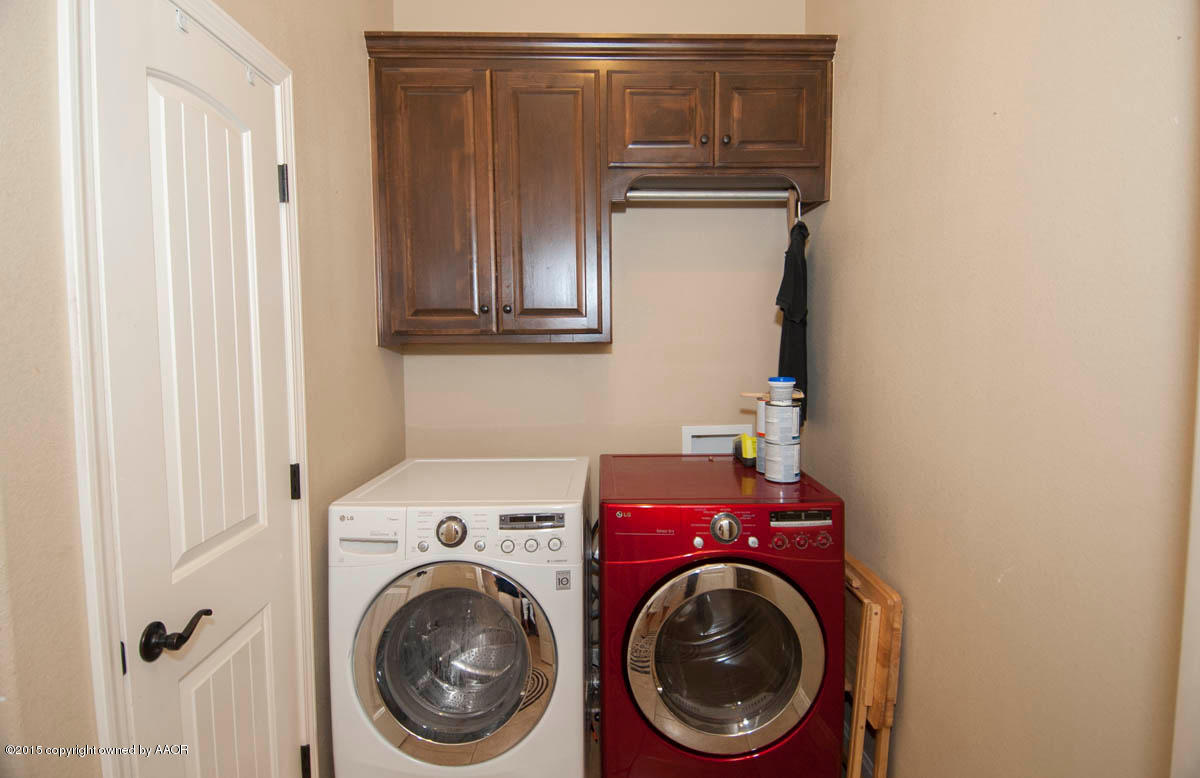 3817 Arden Road Amarillo, TX 79118 - Photo 23 of 30 a utility room with dryer and washer