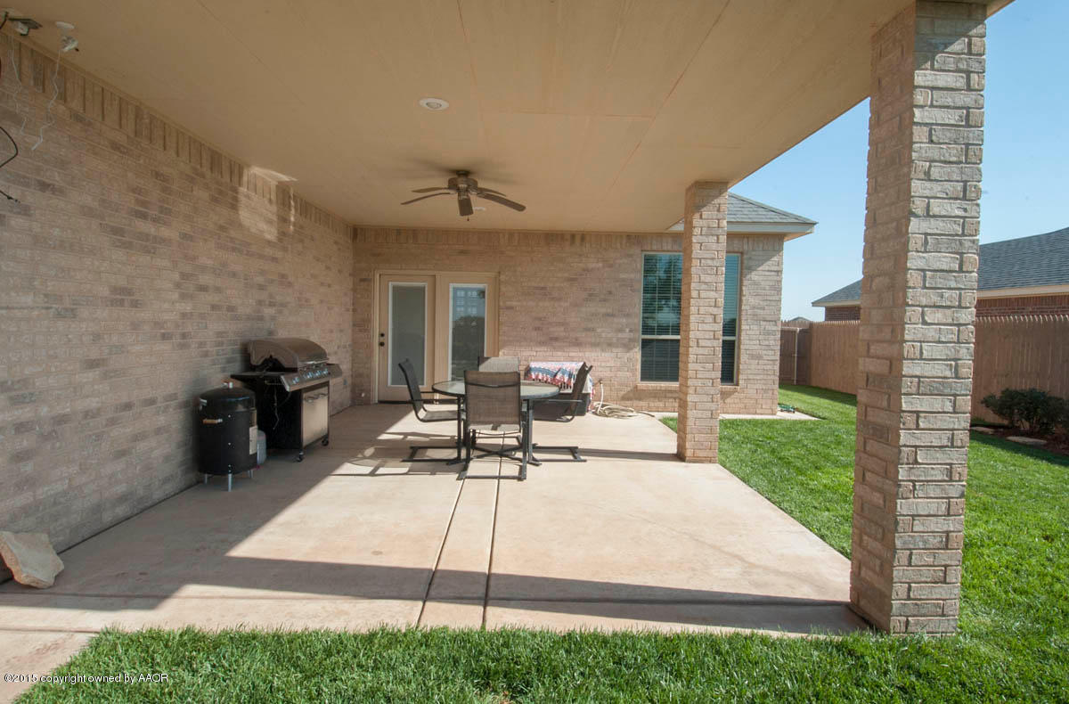 3817 Arden Road Amarillo, TX 79118 - Photo 26 of 30 a view of a backyard with sitting area