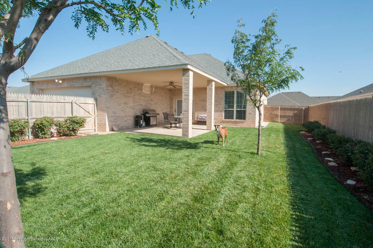 3817 Arden Road Amarillo, TX 79118 - Photo 28 of 30 a view of a house with backyard and porch