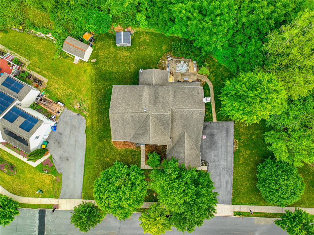138 Clover Hollow Road Easton, PA 18045 - Photo 92 of 95 An aerial perspective showcases the inviting outdoor living space with lush surroundings and practical sheds.