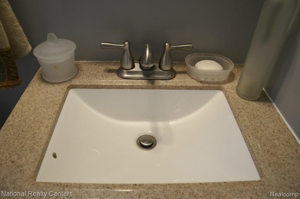 3805 Mapleleaf Road Waterford, MI 48328 - Photo 20 of 30 Granite composite counter top - classic and durable.