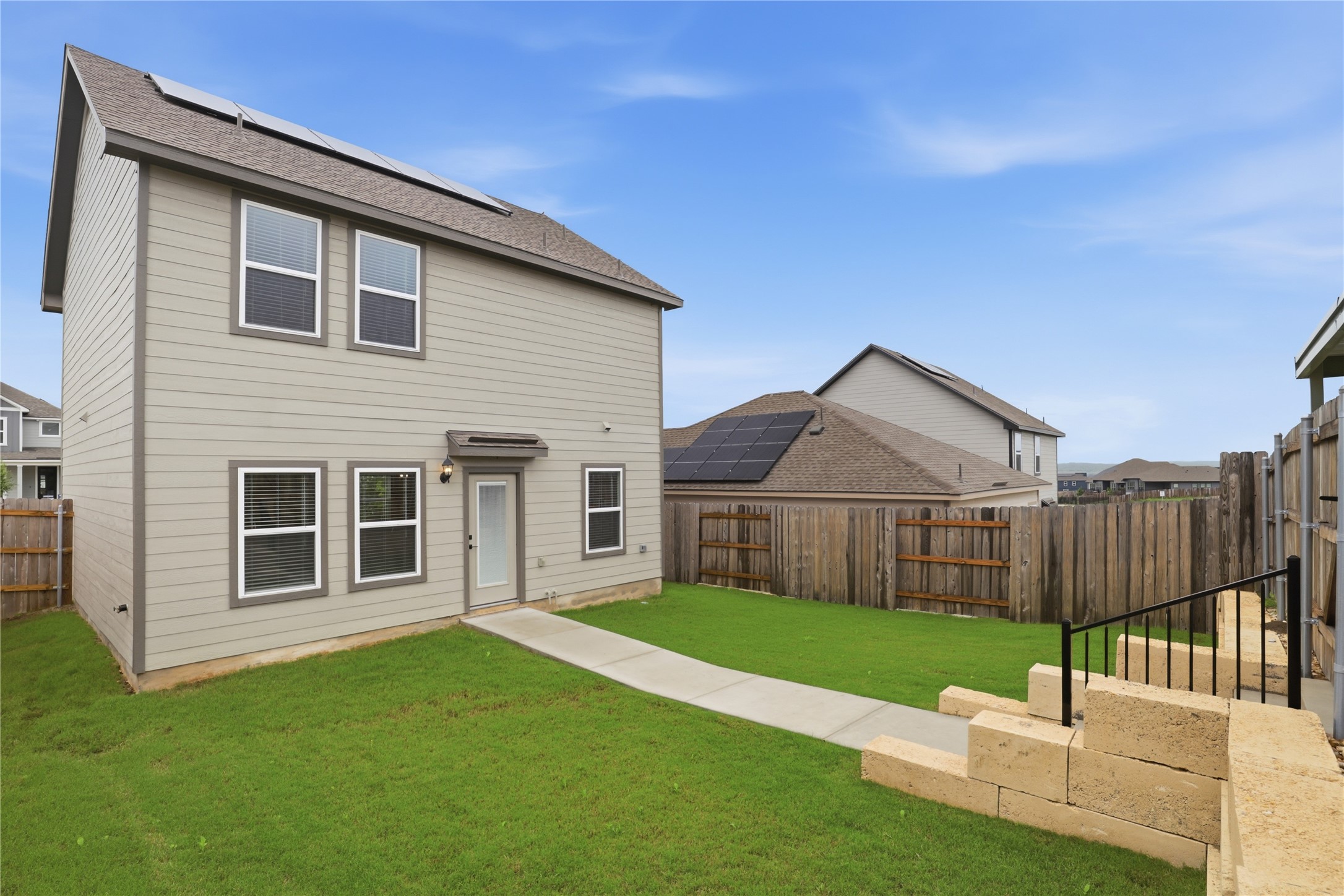 9320 Gladsome Path Manor, TX 78653 - Photo 28 of 34 a house view with garden space
