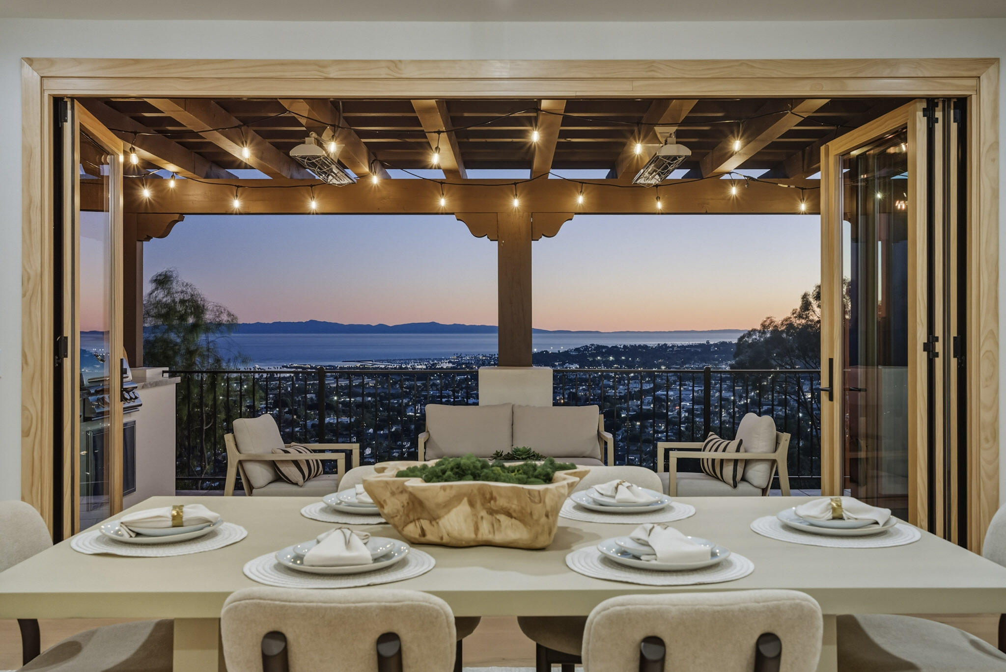 210 Las Alturas Road Santa Barbara, CA 93103 - Photo 4 of 61 a view of a dining table and chairs in the patio