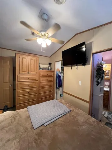 a view of a livingroom with a flat screen tv