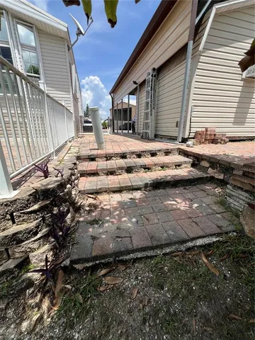 a view of house with yard