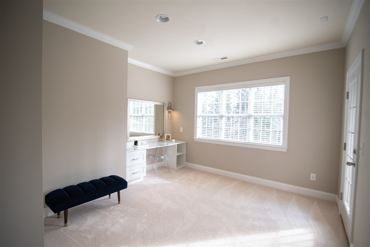 9311 Tabriz Point Raleigh, NC 27614 - Photo 14 of 25 The master bedroom sitting area is so versatile. Use it as a study, vanity or reading nook. Sitting Room