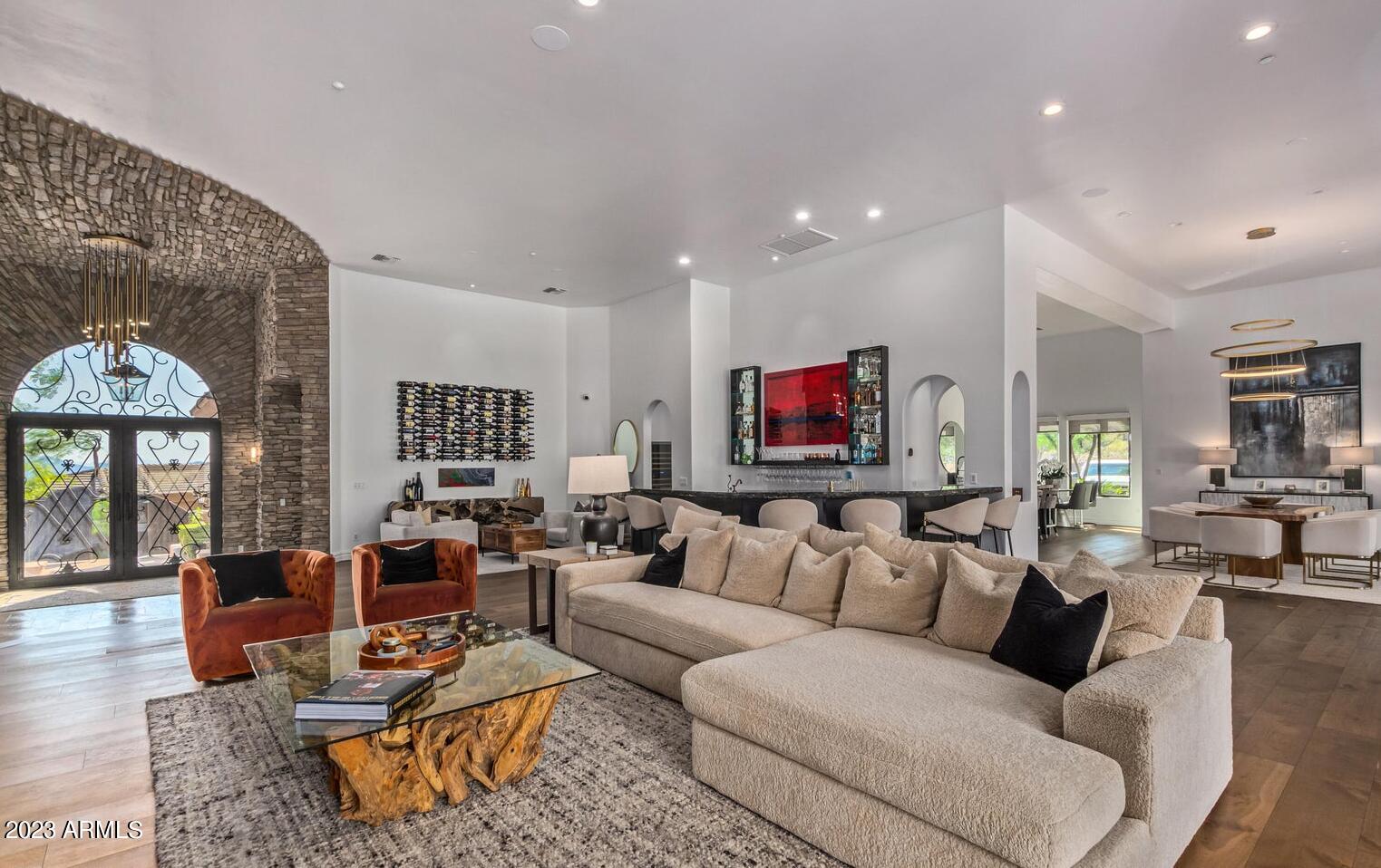 16469 North 113th Way Scottsdale, AZ 85255 - Photo 17 of 47 a living room with furniture wooden floor and a large window