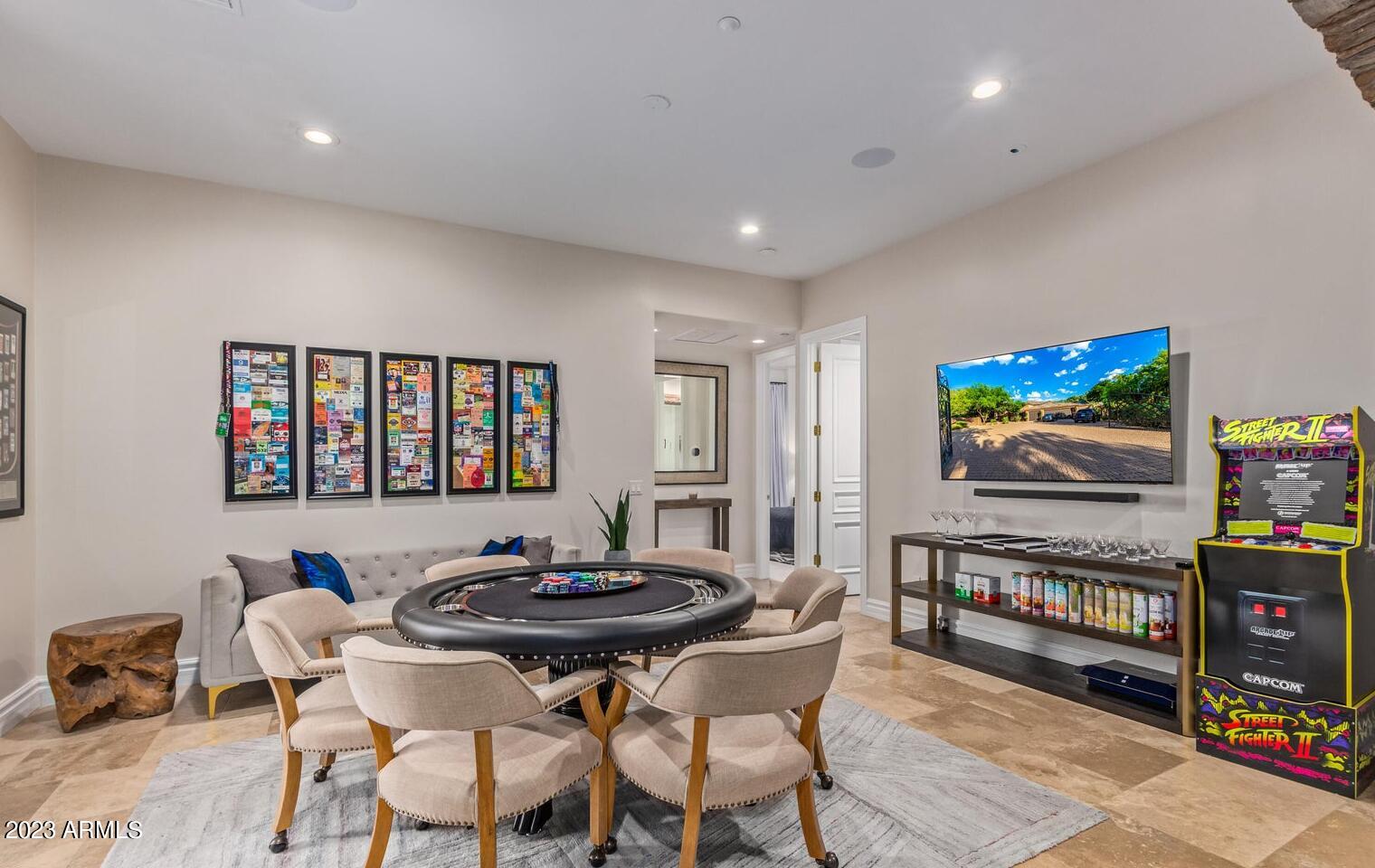 16469 North 113th Way Scottsdale, AZ 85255 - Photo 19 of 47 a living room with furniture and a flat screen tv
