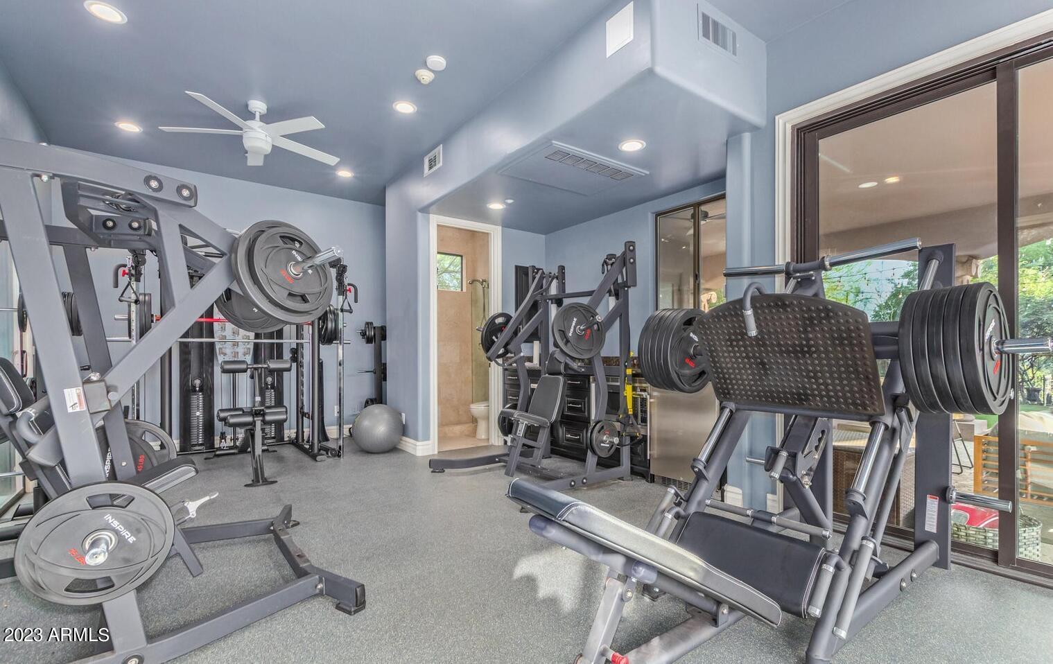 16469 North 113th Way Scottsdale, AZ 85255 - Photo 33 of 47 a view of a room with gym equipment