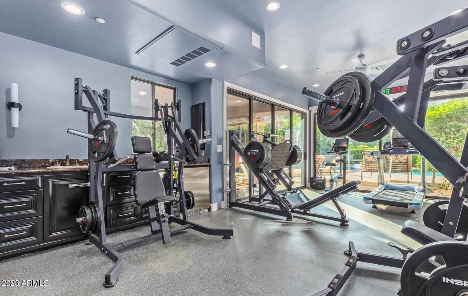 16469 North 113th Way Scottsdale, AZ 85255 - Photo 34 of 47 a view of a room with gym equipment