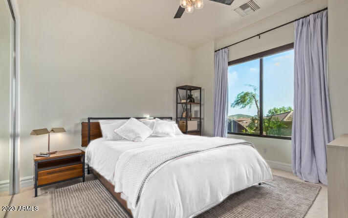 16469 North 113th Way Scottsdale, AZ 85255 - Photo 39 of 47 a bedroom with a bed and a window