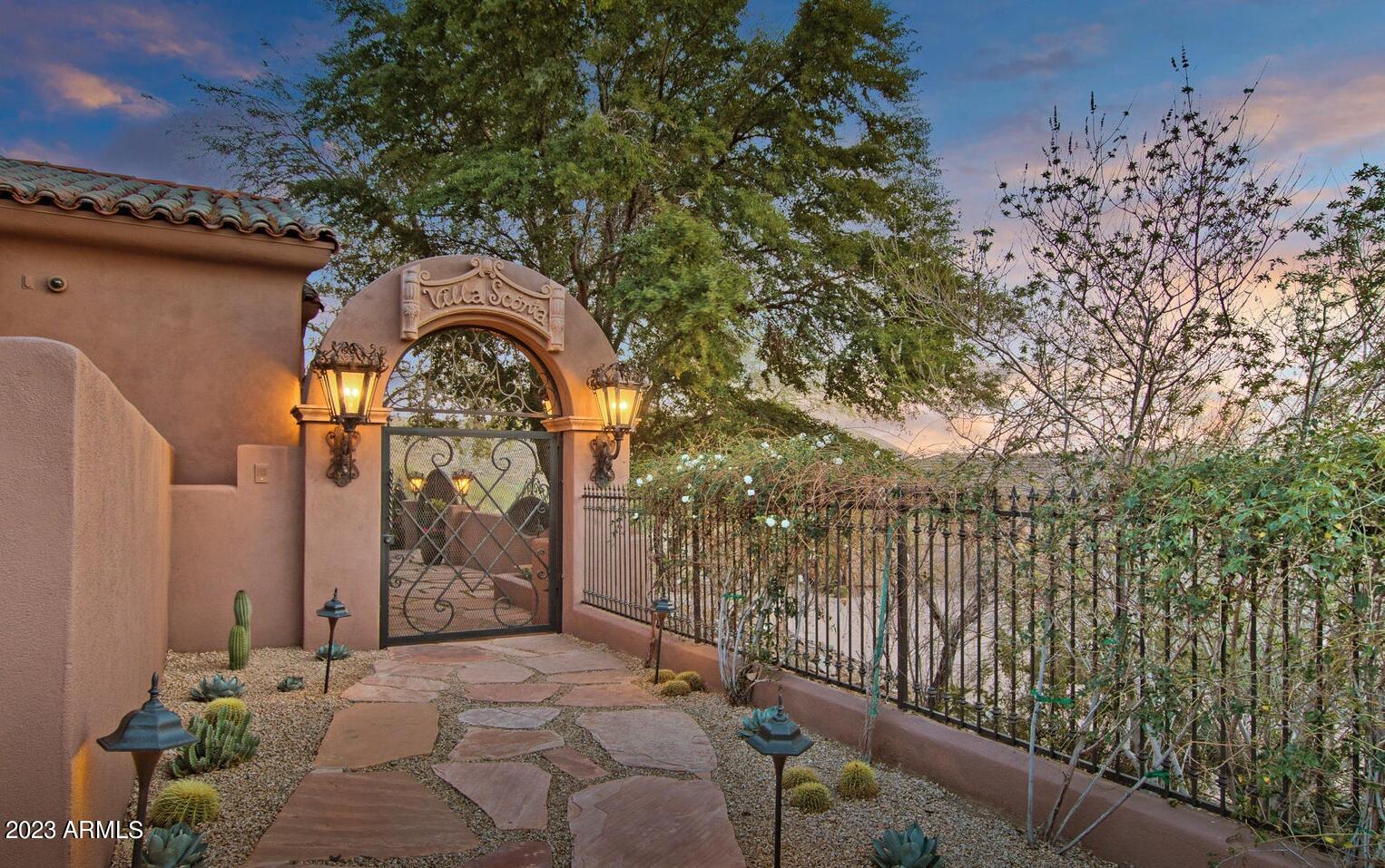 16469 North 113th Way Scottsdale, AZ 85255 - Photo 45 of 47 a view of entrance gate of a house