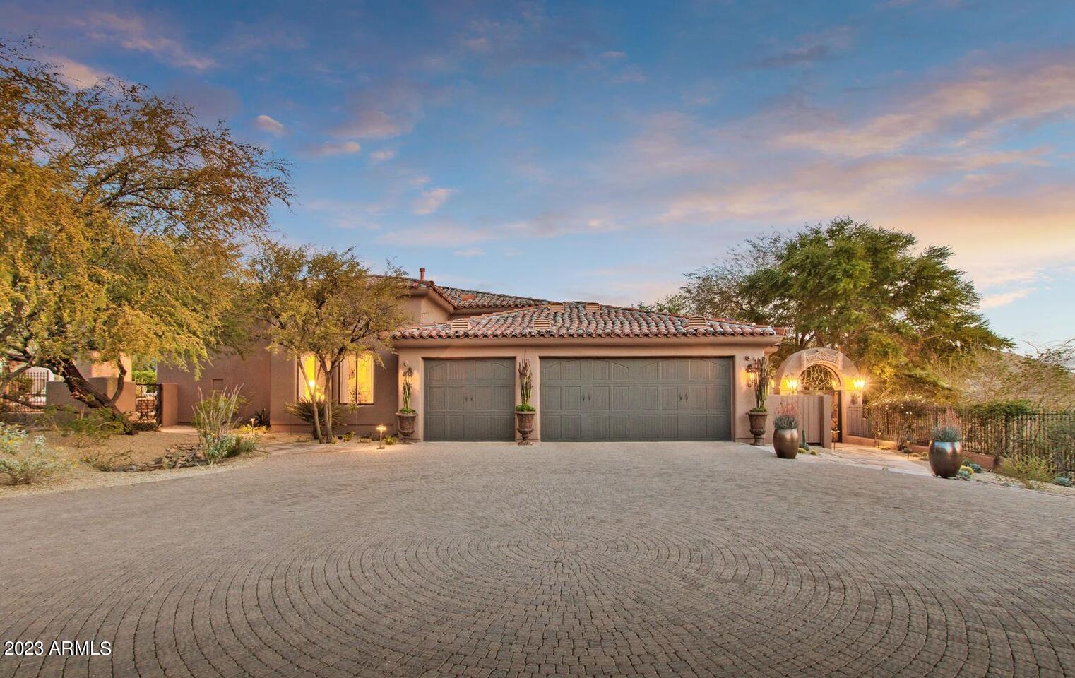 16469 North 113th Way Scottsdale, AZ 85255 - Photo 47 of 47 front view of a house with a snow on the road