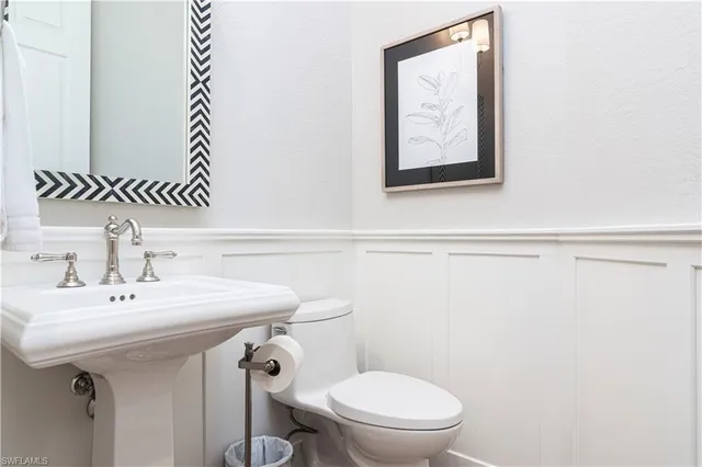 a bathroom with a sink and a toilet