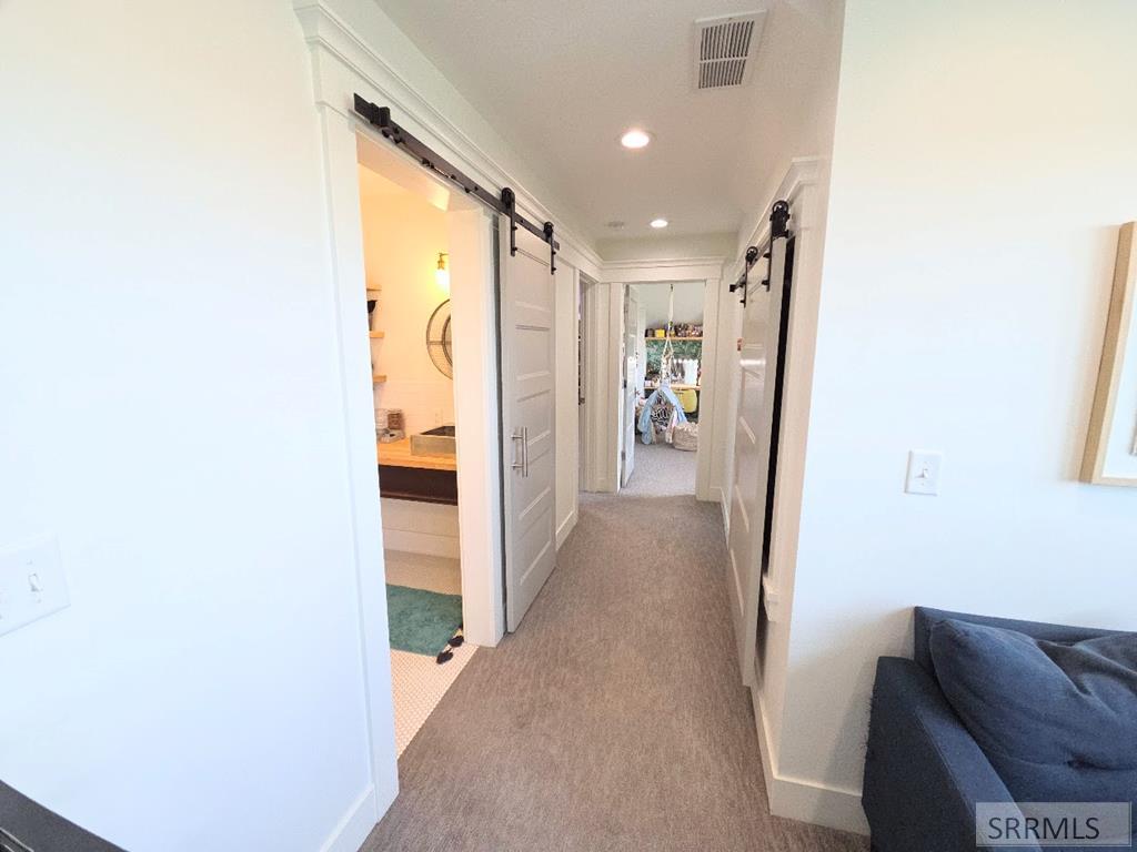 2155 Foothill Road Idaho Falls, ID 83401 - Photo 49 of 78 HALLWAY TO 2 BEDROOMS & A BATHROOM