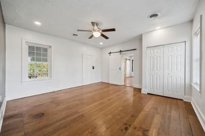 8113 Highway 22, Unit 1 New Alexandria, PA 15670 - Photo 23 of 37 wooden floor in an empty room with a window