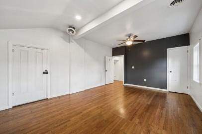 8113 Highway 22, Unit 1 New Alexandria, PA 15670 - Photo 25 of 37 a view of an empty room with a ceiling fan and window