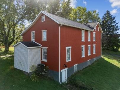 8113 Highway 22, Unit 1 New Alexandria, PA 15670 - Photo 30 of 37 a front view of a house with garden