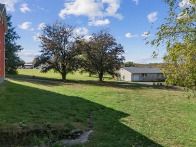 8113 Highway 22, Unit 1 New Alexandria, PA 15670 - Photo 31 of 37 a view of a house with a big yard