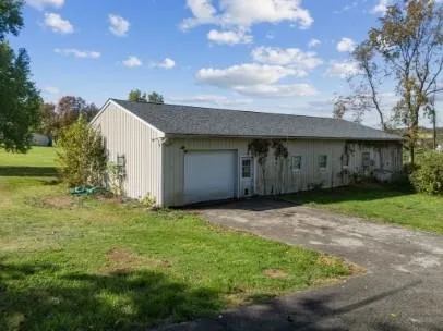 a house view with a garden space