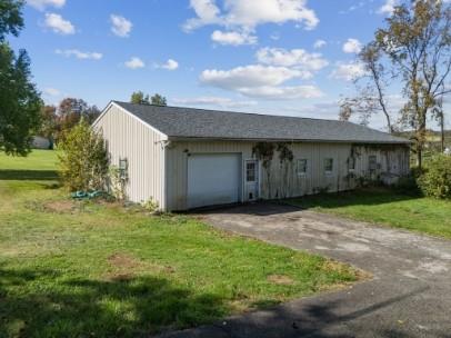 8113 Highway 22, Unit 1 New Alexandria, PA 15670 - Photo 36 of 37 a house view with a garden space