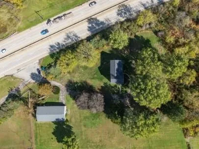 a view of a garden with a fountain