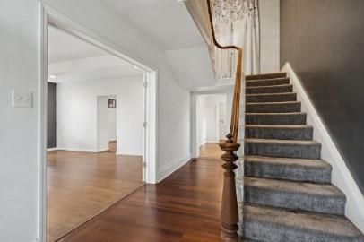 8113 Highway 22, Unit 1 New Alexandria, PA 15670 - Photo 8 of 37 a view of an entryway with wooden floor