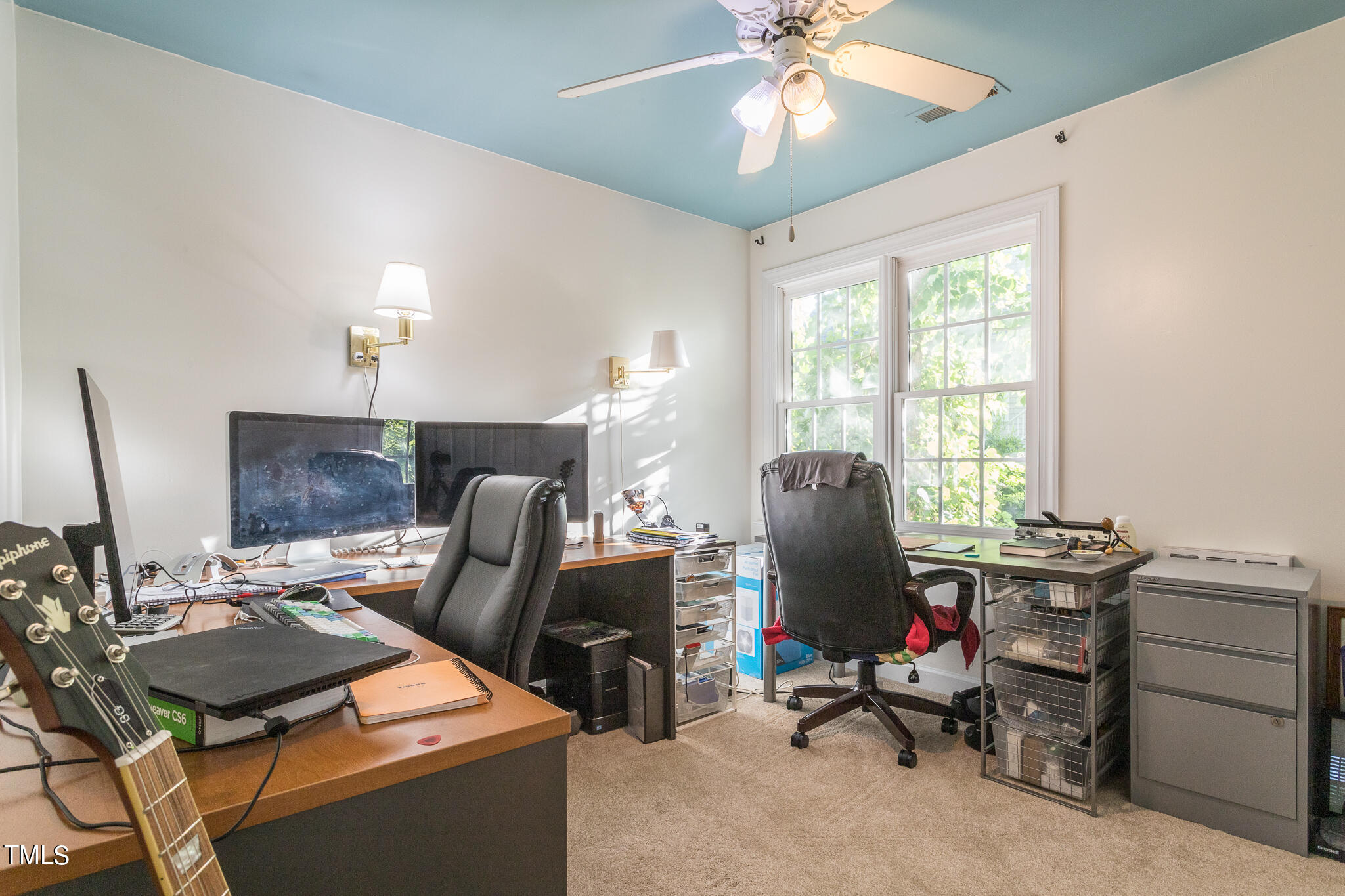 2110 Reaves Drive Raleigh, NC 27608 - Photo 14 of 36 a view of a workspace with furniture and a window