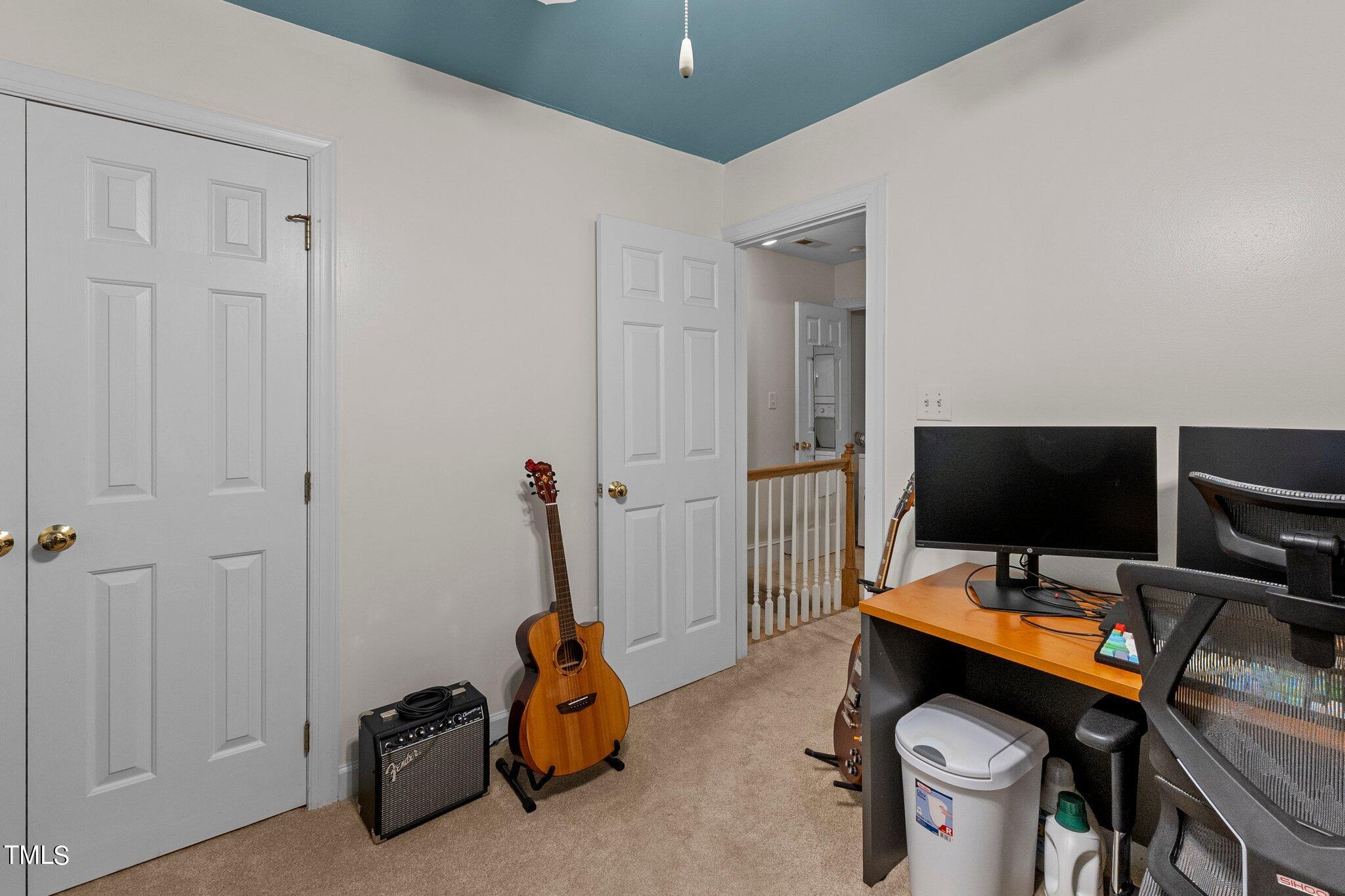 2110 Reaves Drive Raleigh, NC 27608 - Photo 15 of 36 a view of a workspace with furniture