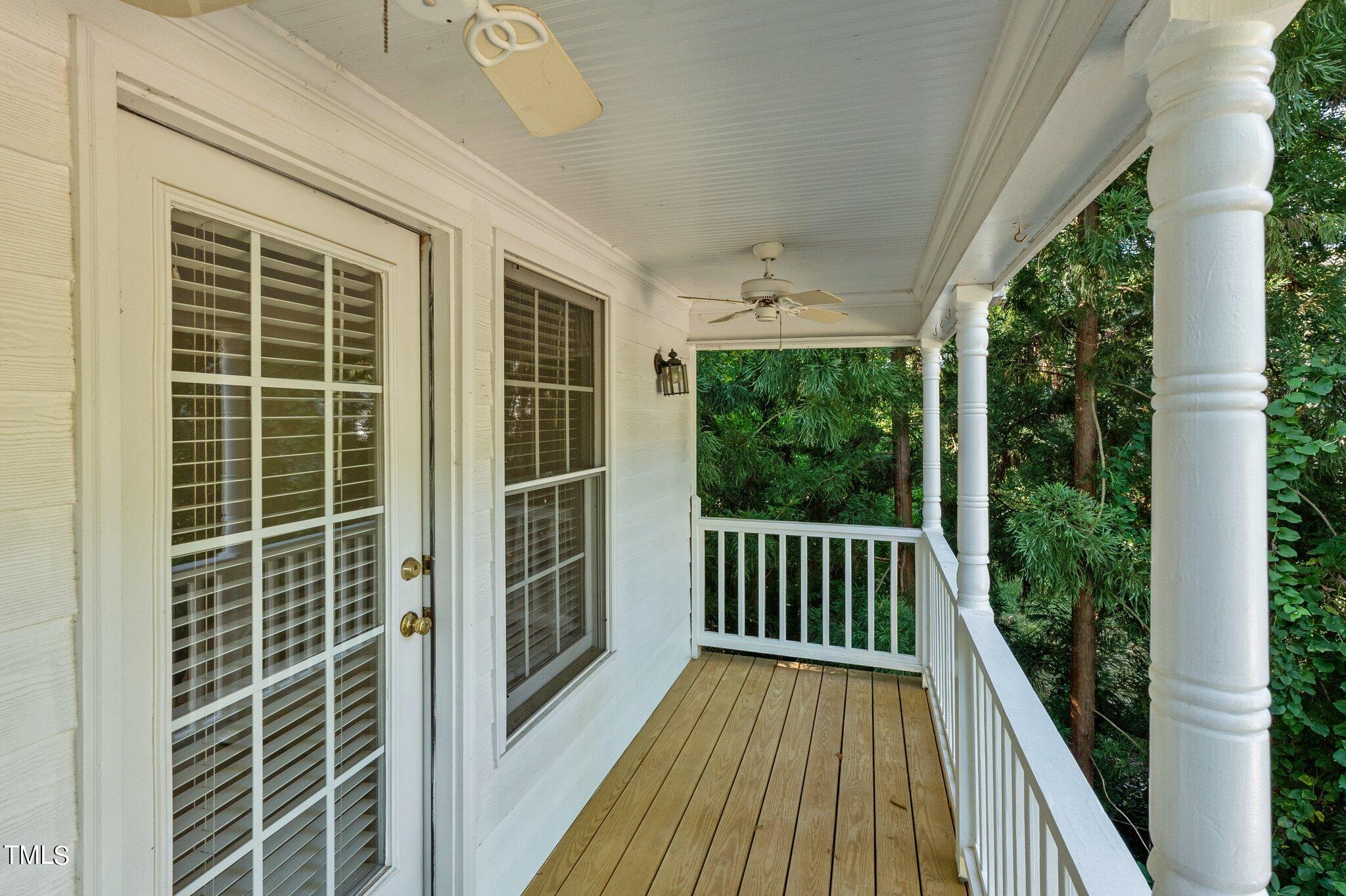 2110 Reaves Drive Raleigh, NC 27608 - Photo 3 of 36 a view of balcony with wooden floor