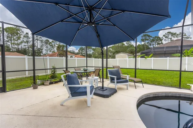 a view of yard with seating area