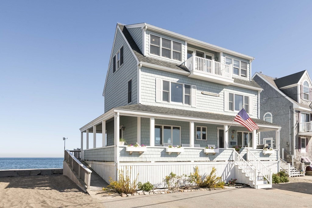 11 Lighthouse Road Scituate, MA 02066 - Photo 1 of 34 a front view of a house with a garden and balcony