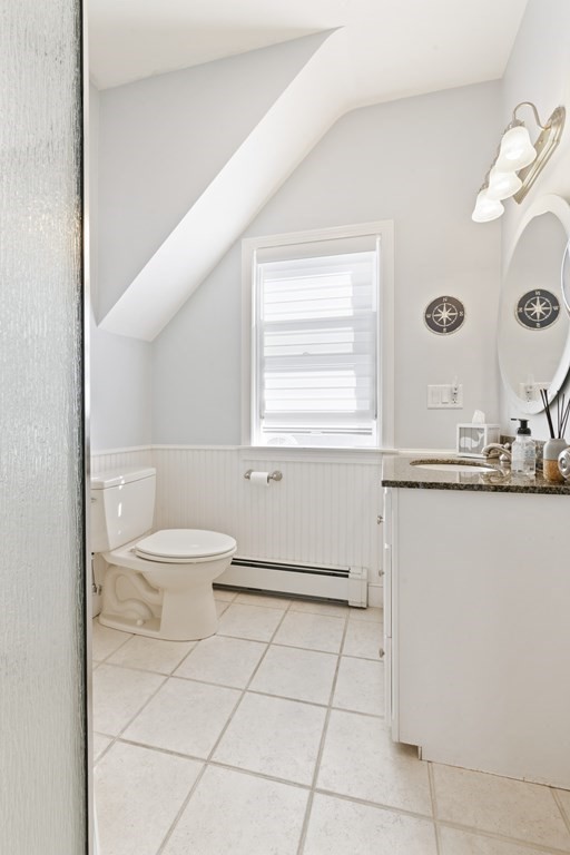11 Lighthouse Road Scituate, MA 02066 - Photo 17 of 34 a bathroom with a sink a toilet and a mirror