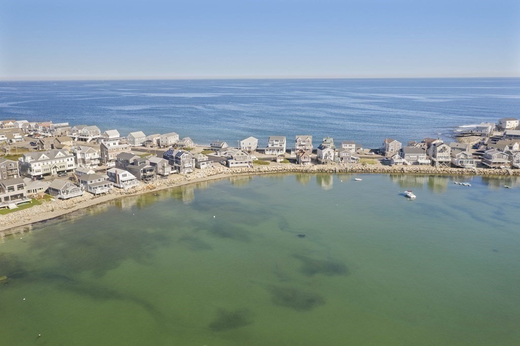 11 Lighthouse Road Scituate, MA 02066 - Photo 29 of 34 a view of a ocean with beach