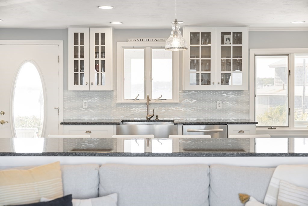 11 Lighthouse Road Scituate, MA 02066 - Photo 5 of 34 a kitchen with granite countertop a sink and a window