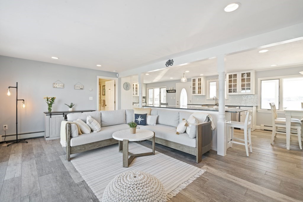 11 Lighthouse Road Scituate, MA 02066 - Photo 10 of 34 a living room with furniture white walls and wooden floor